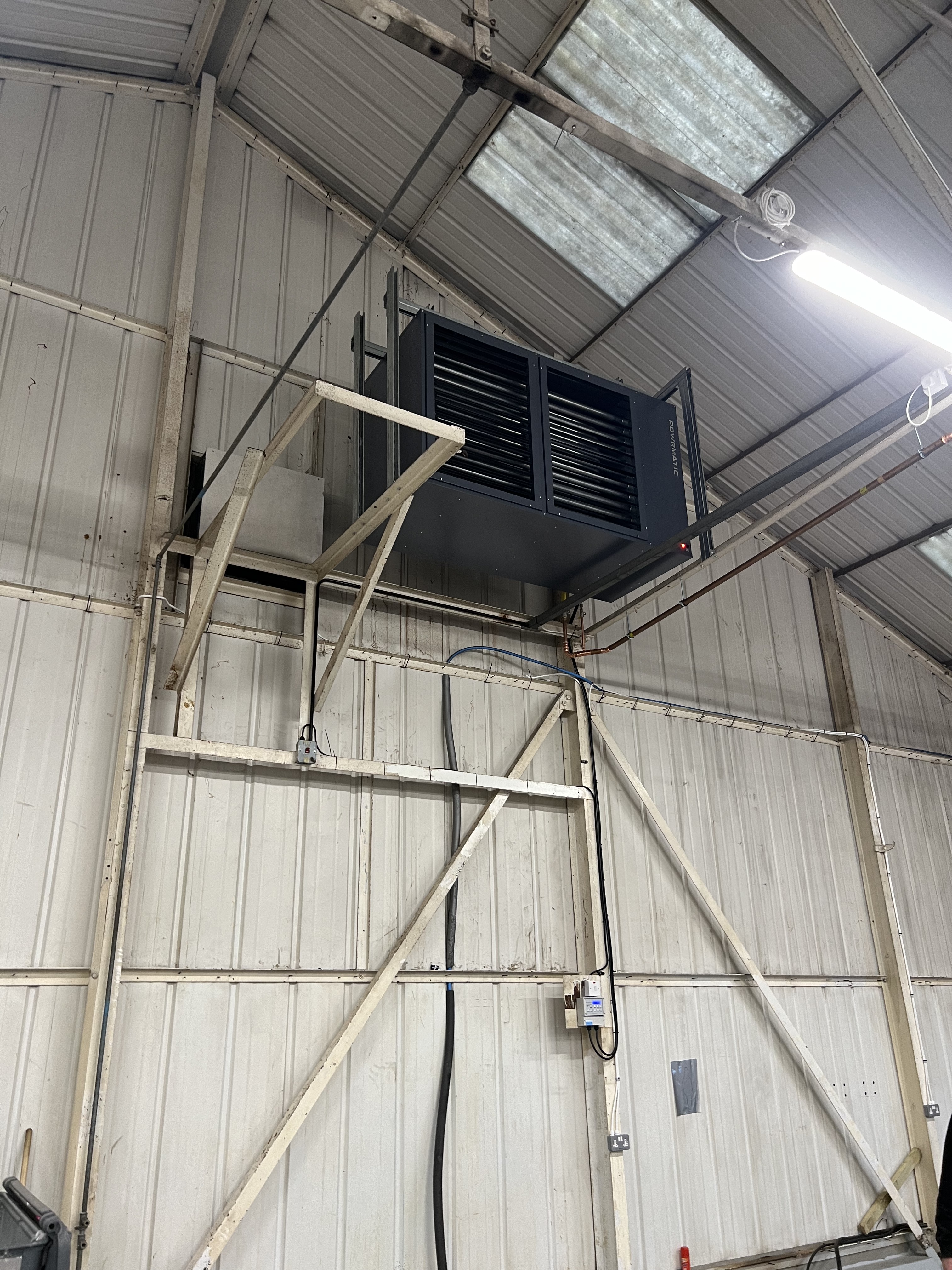 Powrmatic warm-air heater installed in a warehouse