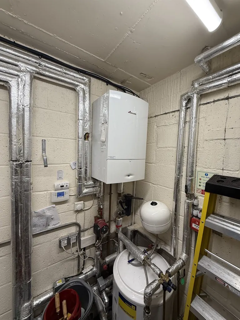 Old Worcester Bosch CDi Classic boiler in the Carterton Town Hall plant room before replacement