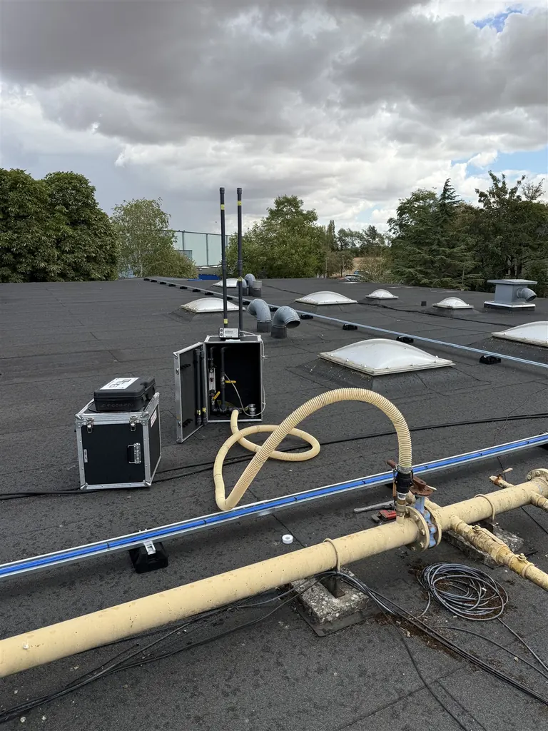Test equipment and hoses beside the new rooftop gas main at Faringdon Community College