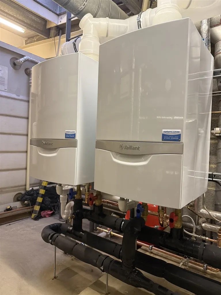 Twin Vaillant ecoTEC Plus commercial boilers above the insulated reverse-return pipework
