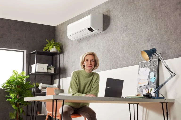 Samsung WindFree wall-mounted air conditioner in a work and living space