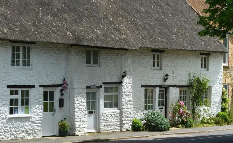 Thatched cottages on Church Green in Stanford in the Vale