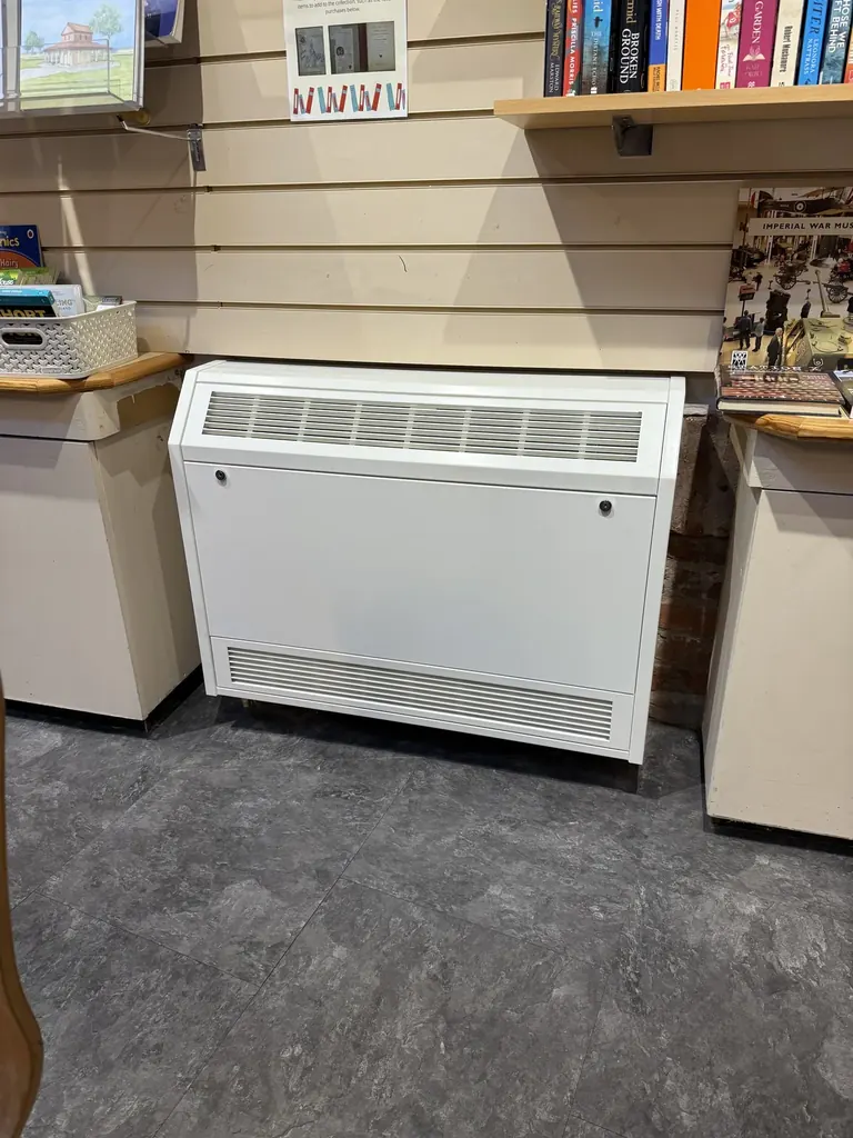 Second replacement room convector heater installed in the Vale and Downland Museum shop