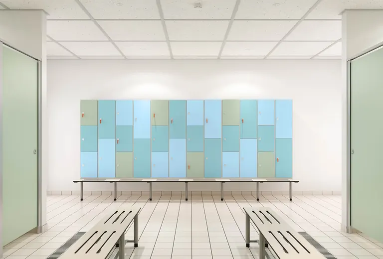 Venesta changing-room example with blue lockers and freestanding benches