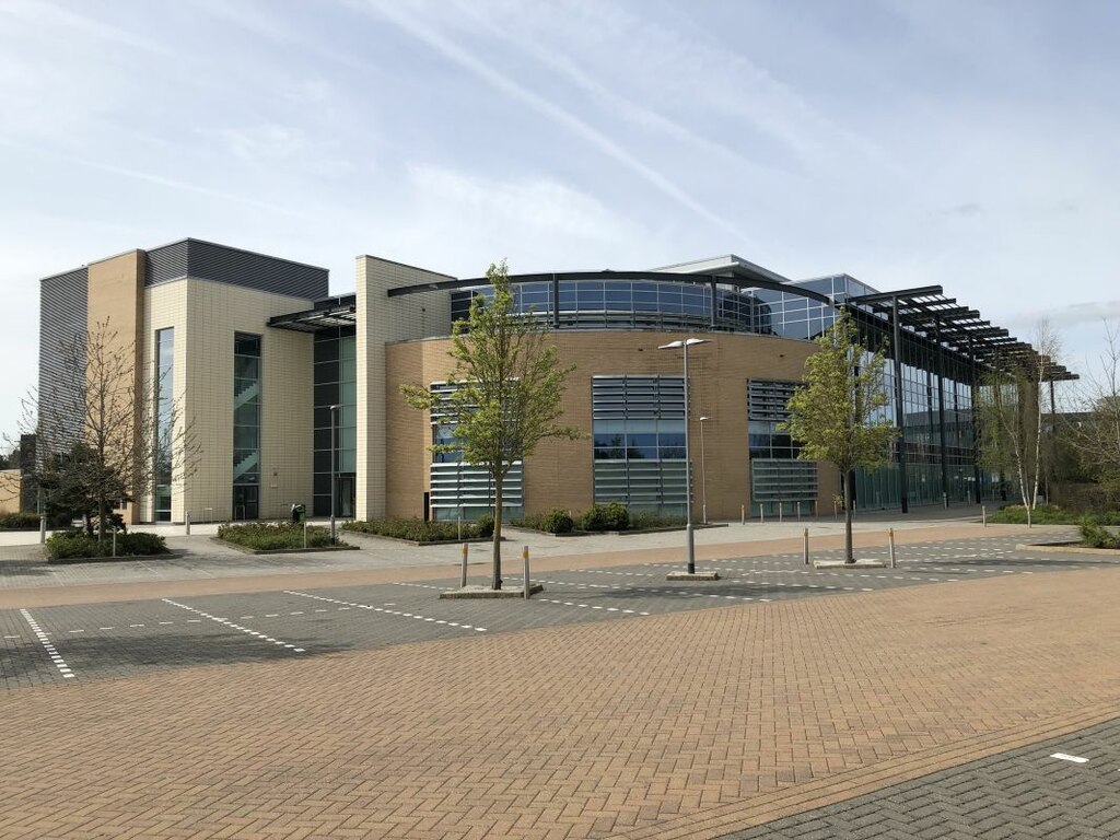 Modern brick and glass office building at Oxford Business Park.