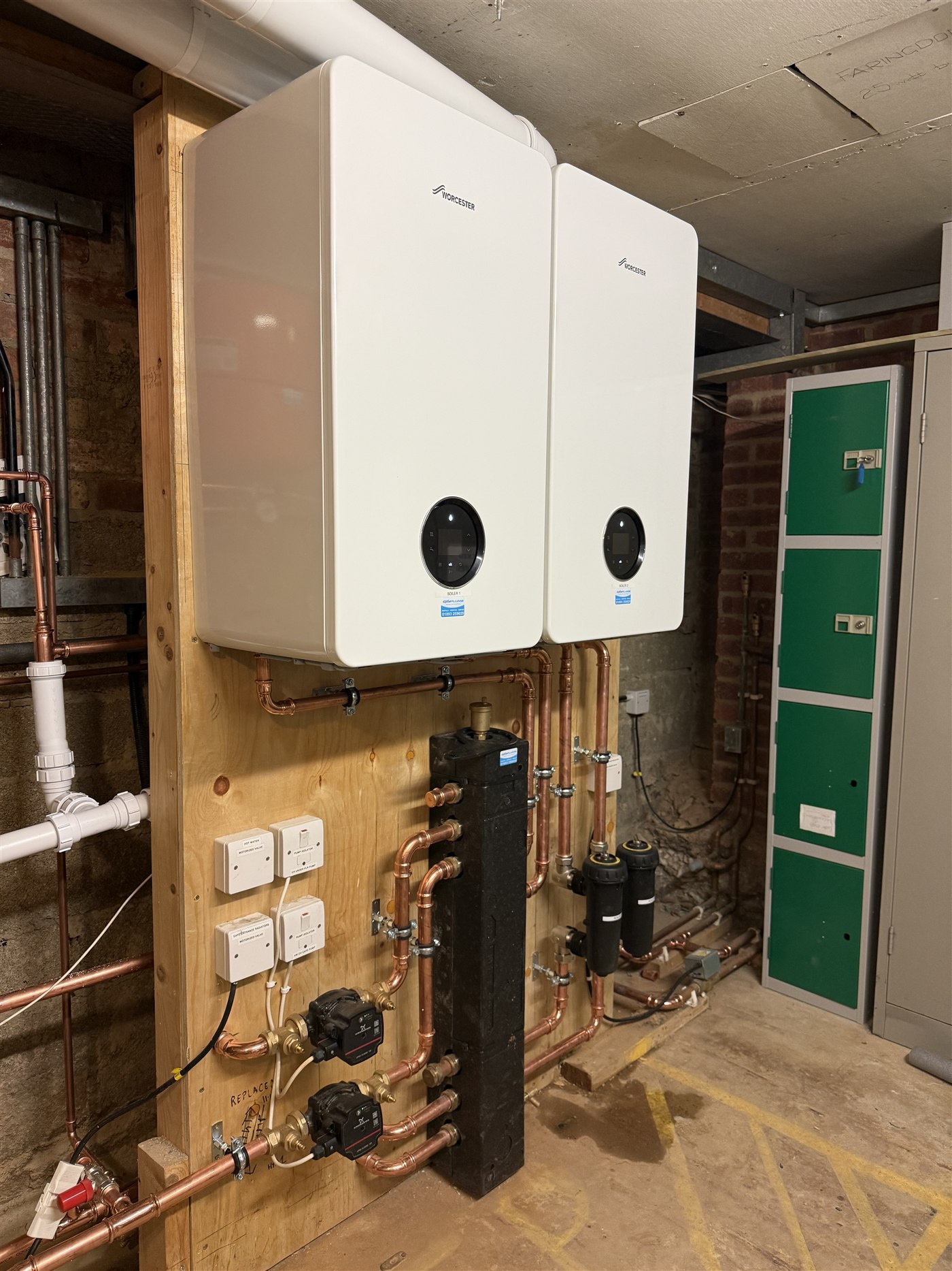 Twin Worcester commercial boilers with copper manifold and circulation pumps